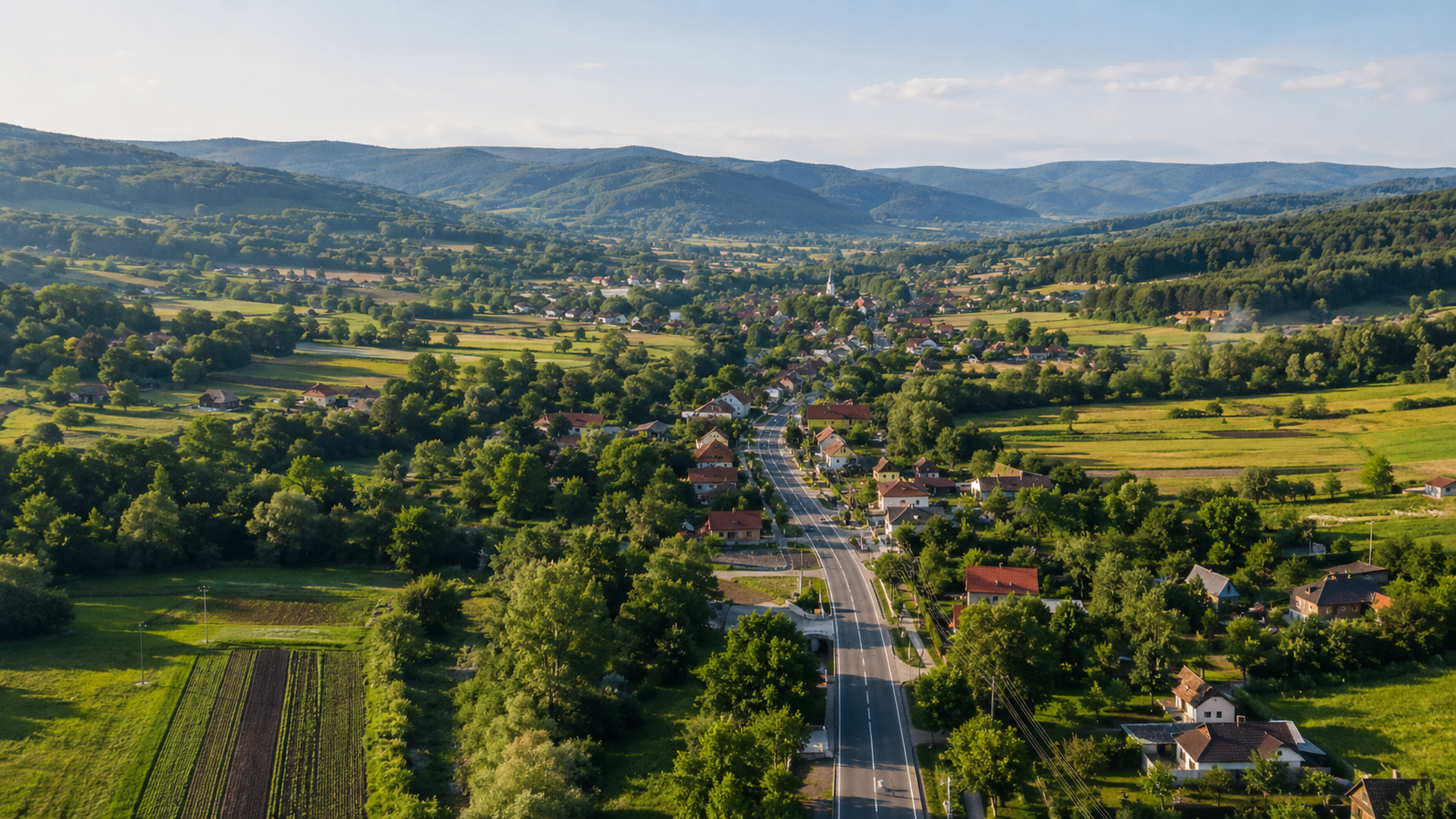 Imagine ilustrativă cu o comună rurală văzută de la înălțime
